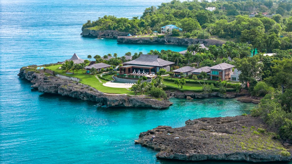 Stunning aerial photo of a luxury resort surrounded by turquoise waters in Rio San Juan, Dominican Republic.