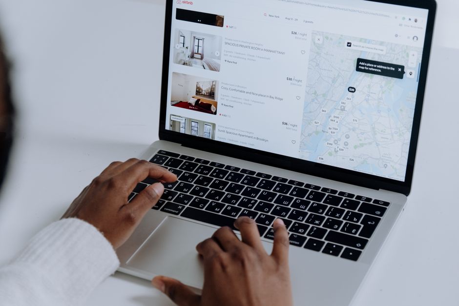Booking flights on a laptop