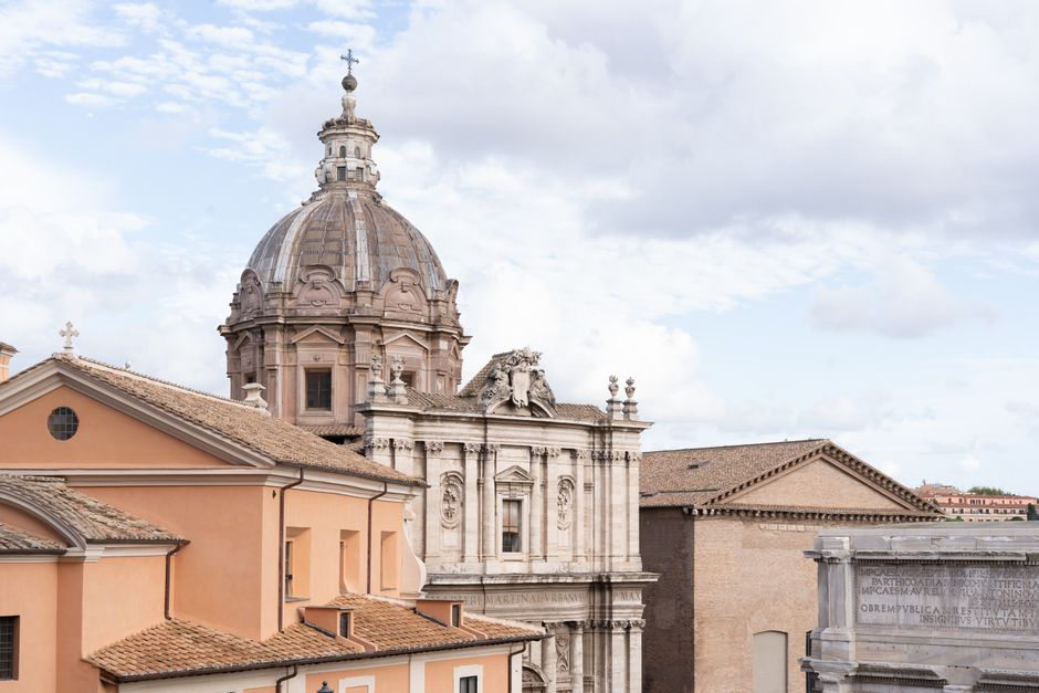Discover the stunning architecture of Rome, Italy, featuring iconic domes and ancient structures.