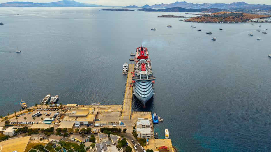 Aerial shot of a large cruise ship docked at Bodrum harbor in Türkiye.