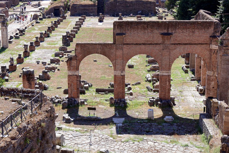 Explore the ancient ruins of Basilica Julia in the Roman Forum, a landmark of historical significance in Rome.