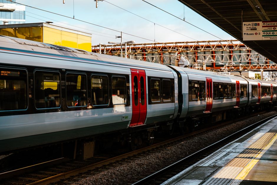 A sleek train at a London station, showcasing contemporary transportation infrastructure.