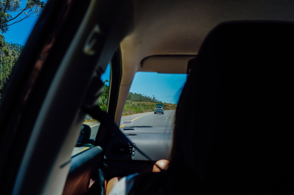 A scenic drive captured from inside a car, illustrating the journey and landscape.